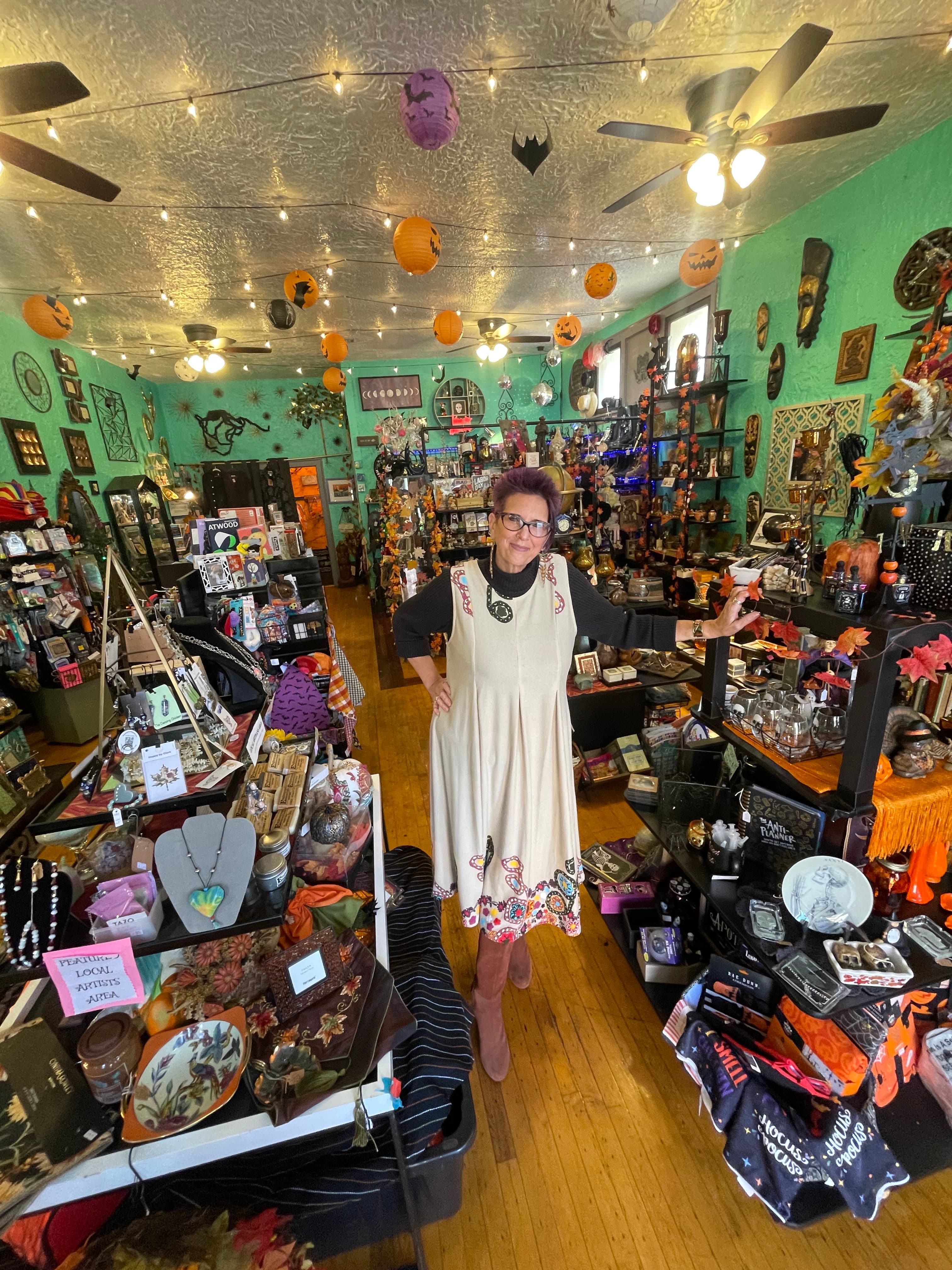 Professional portrait of shop owner inside of Ecclection store